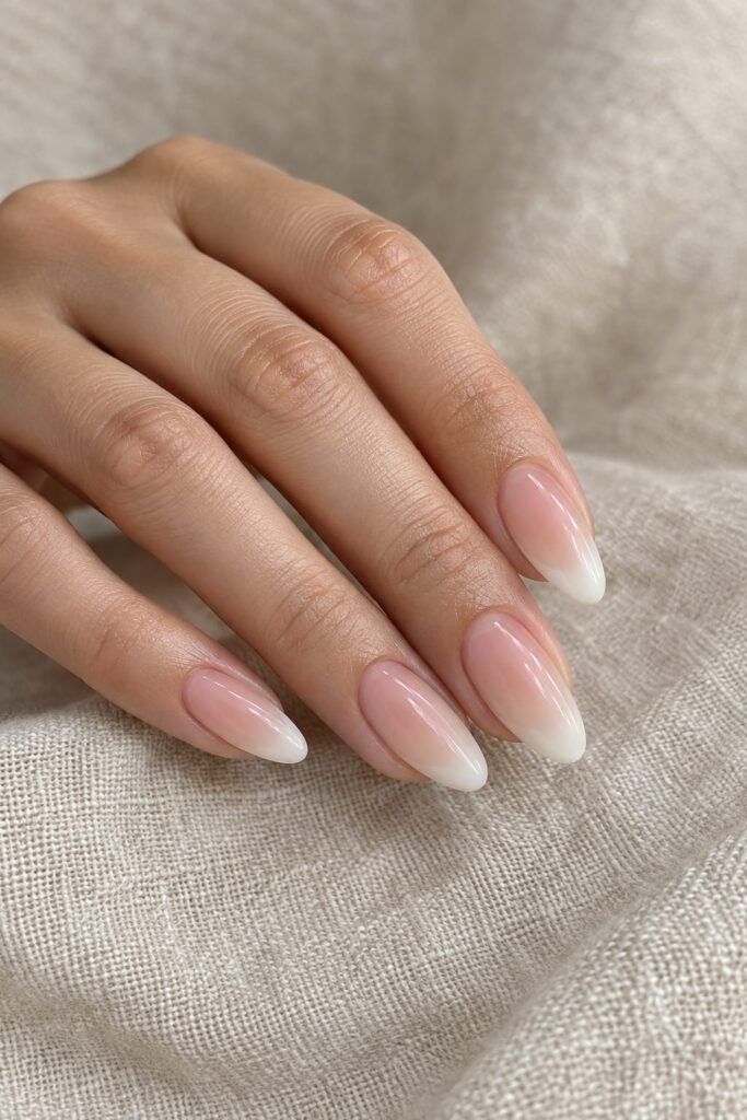  Almond foggy French nails with a milky pink base and creamy blurred tips