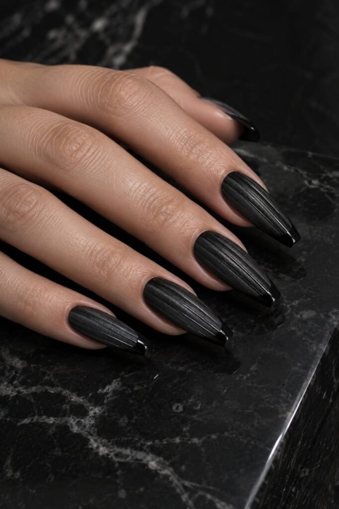 Black ribbed glass nails with fine glossy French tips