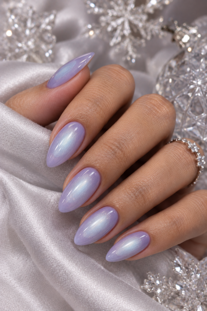 Medium almond lavender nails with a subtle pale icy aura effect