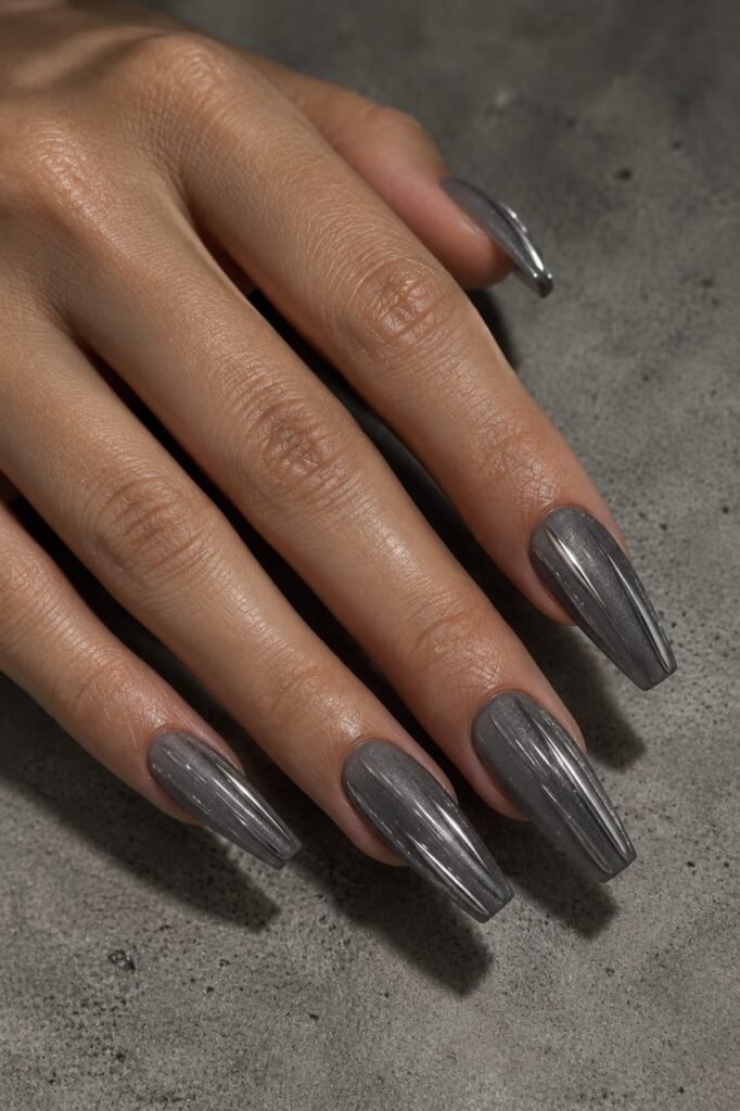 Smoky gray ribbed glass nails with selective silver chrome ribs